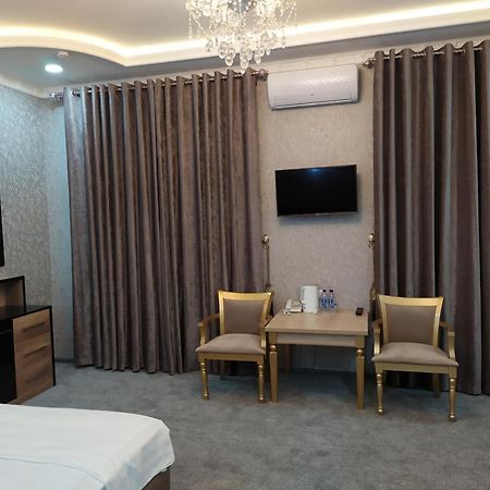 Diyor Hotel Marghilon Екстер'єр фото