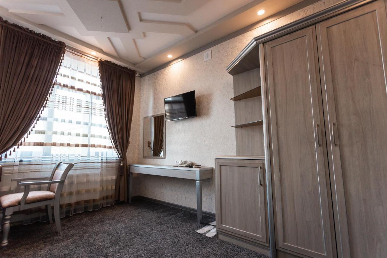 Diyor Hotel Marghilon Екстер'єр фото