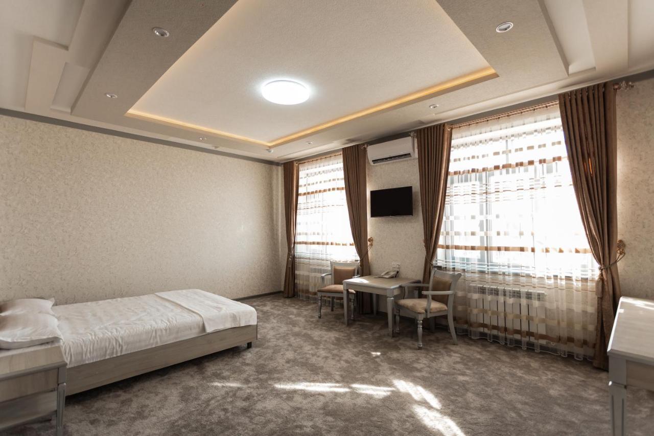 Diyor Hotel Marghilon Екстер'єр фото
