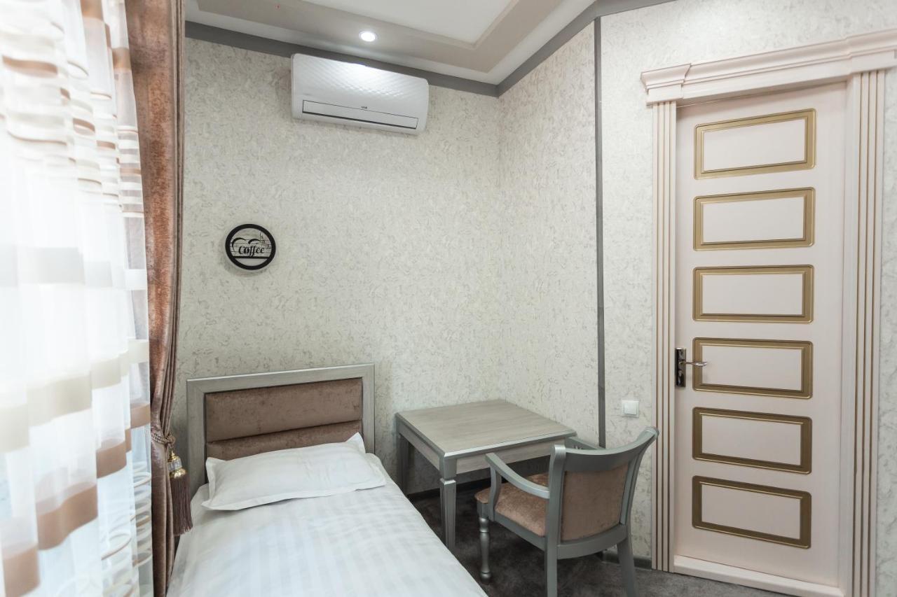 Diyor Hotel Marghilon Екстер'єр фото