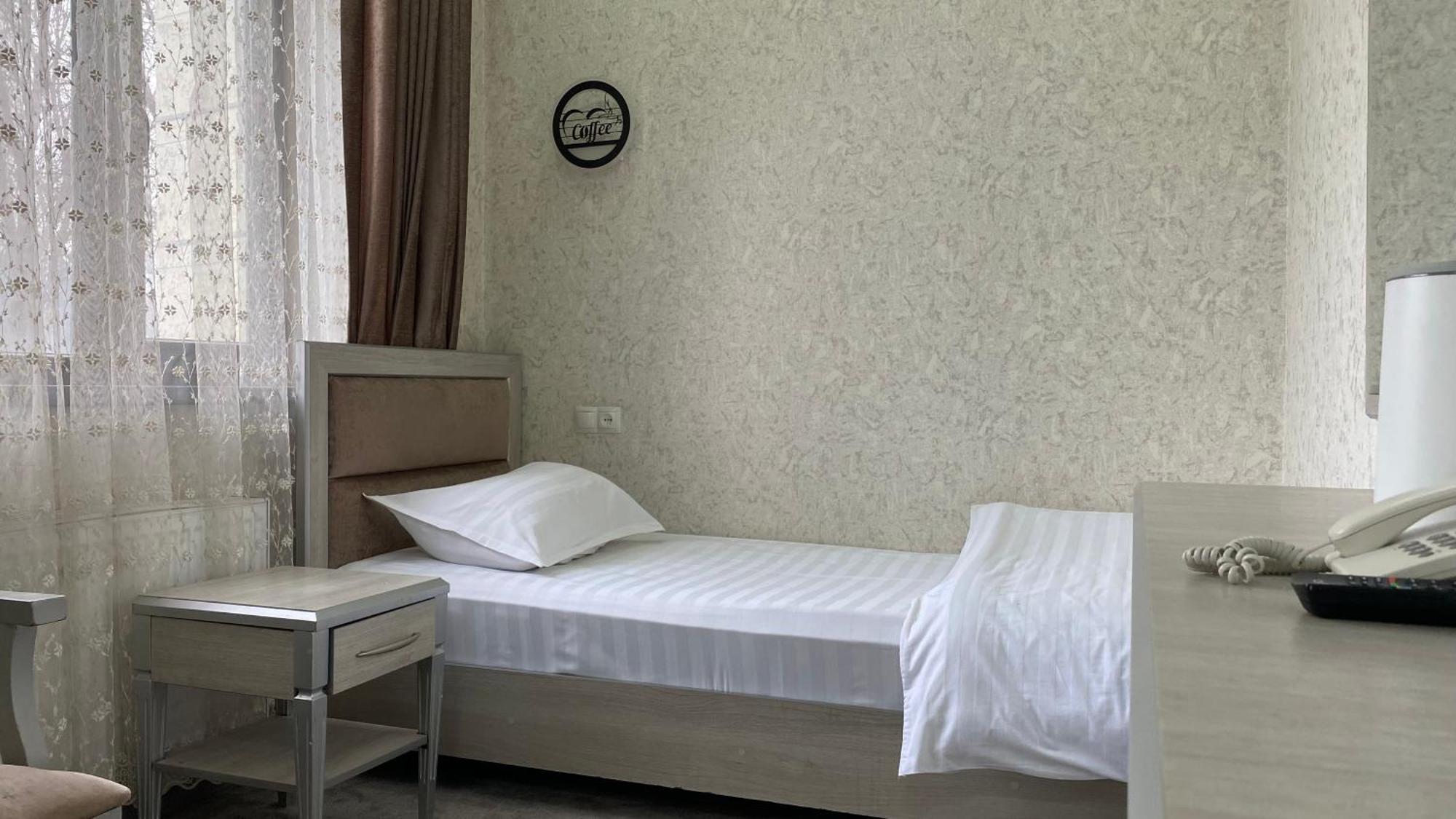 Diyor Hotel Marghilon Екстер'єр фото