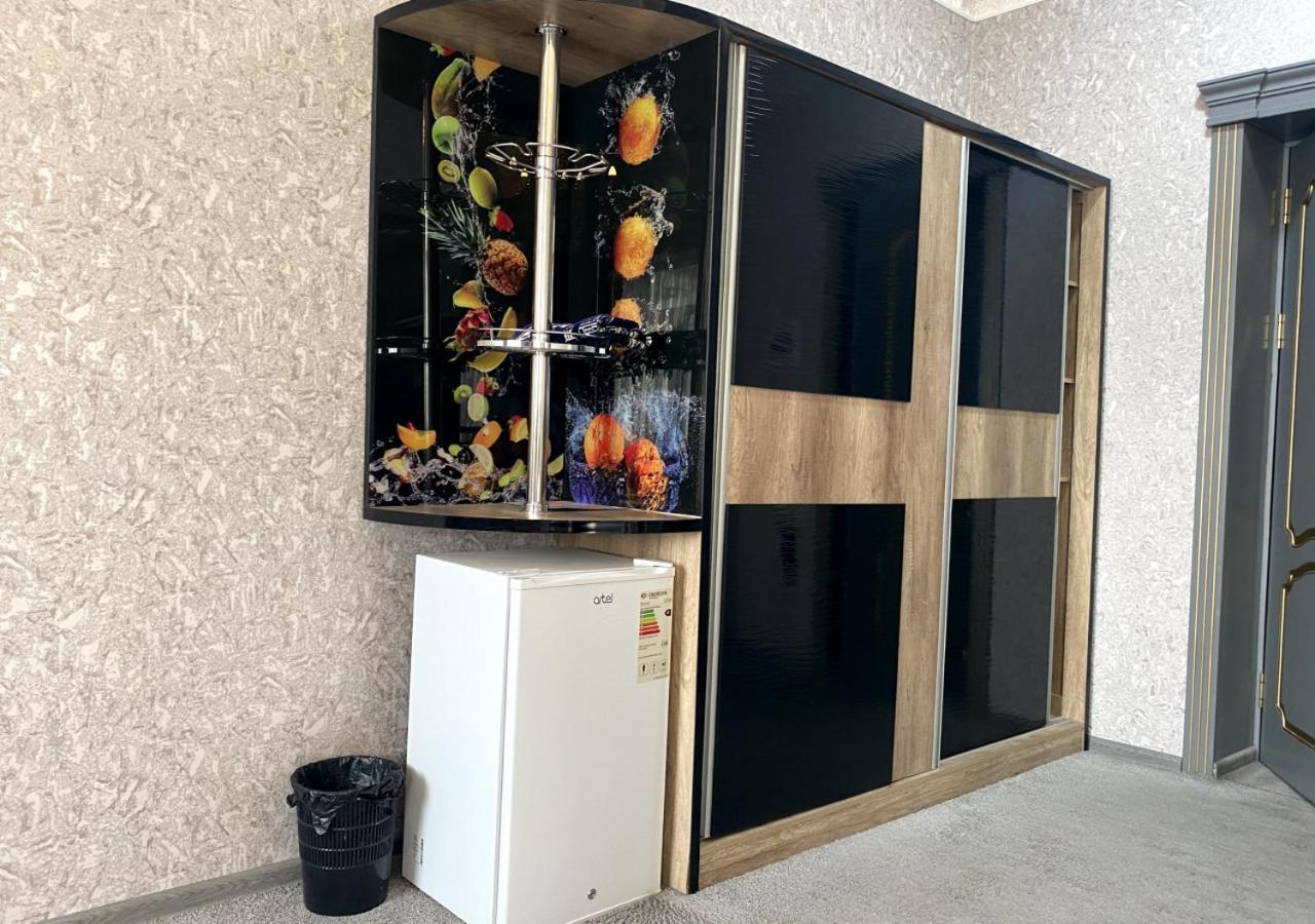 Diyor Hotel Marghilon Екстер'єр фото