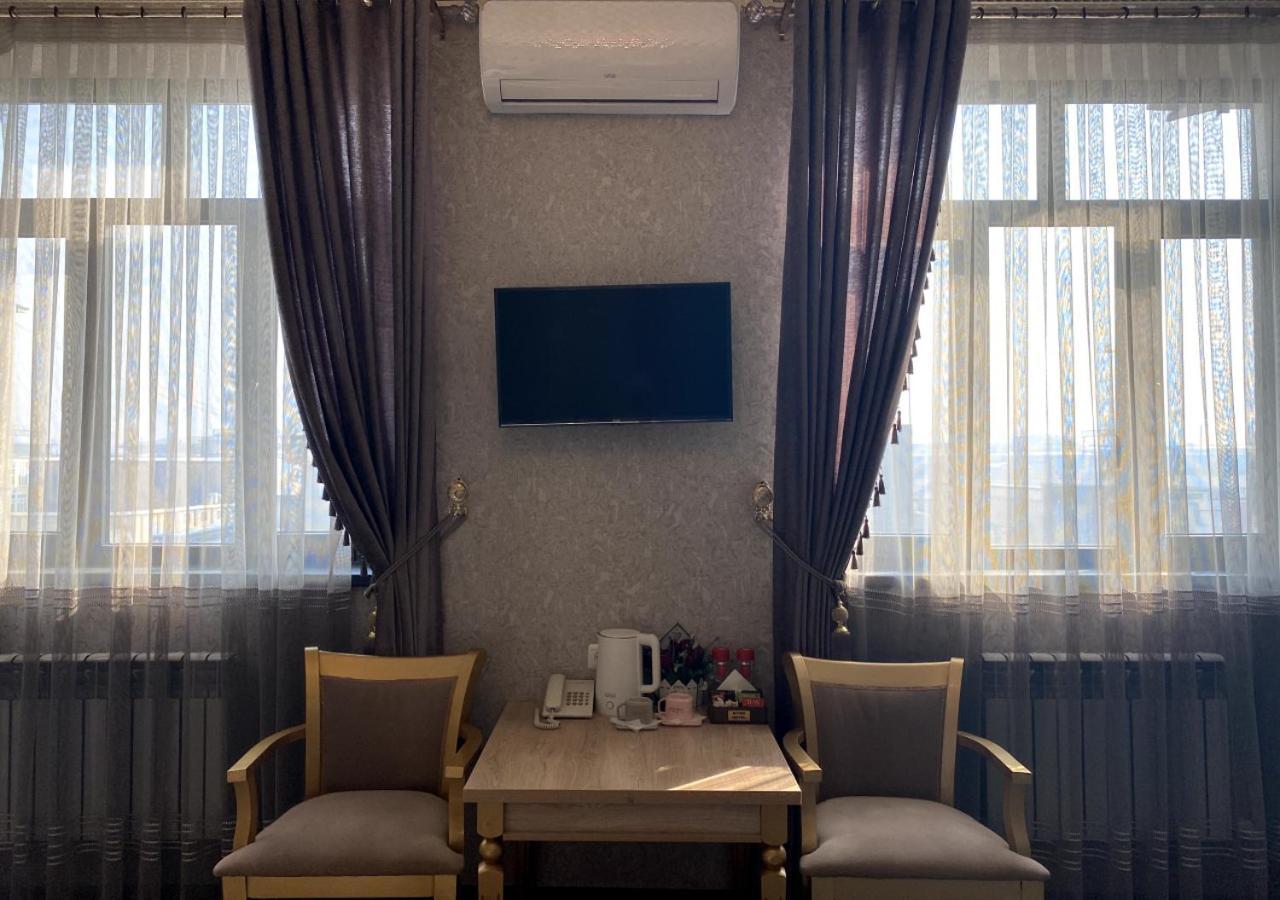 Diyor Hotel Marghilon Екстер'єр фото
