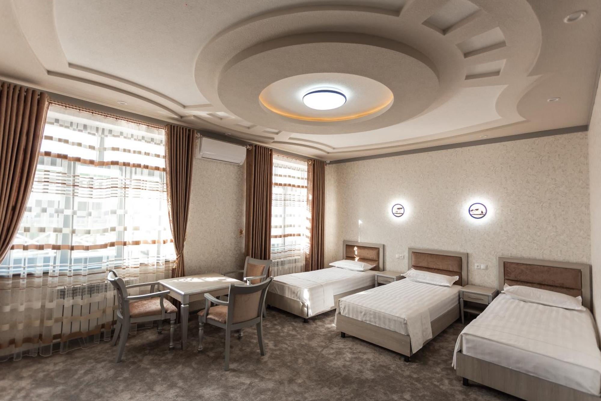 Diyor Hotel Marghilon Екстер'єр фото