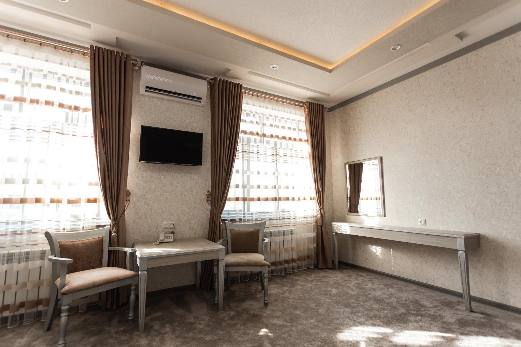 Diyor Hotel Marghilon Екстер'єр фото