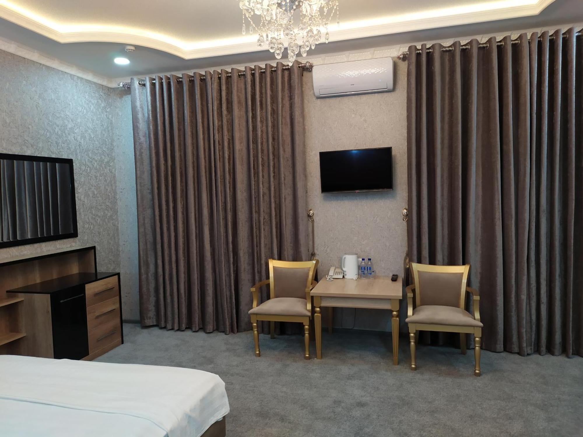 Diyor Hotel Marghilon Екстер'єр фото